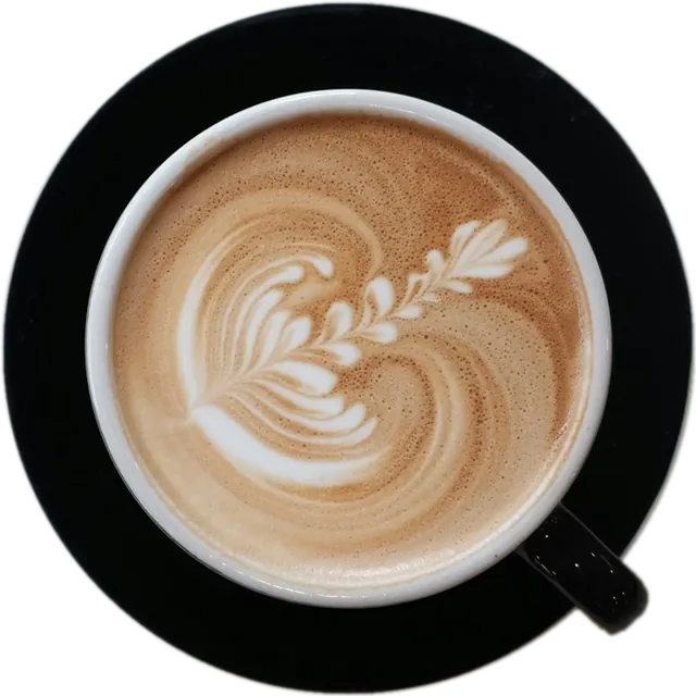 A latte on a black saucer, seen from above