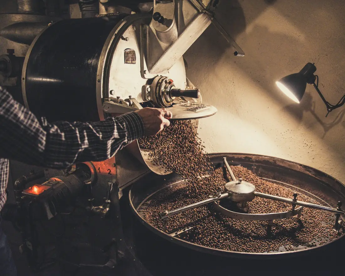 The roaster dropping a batch into the cooling tray