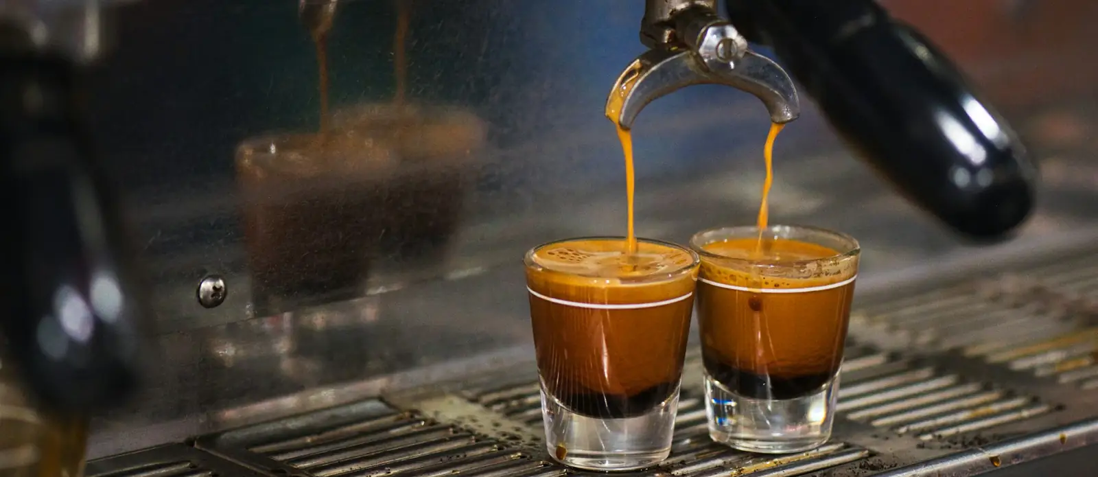 Two espresso shots pouring